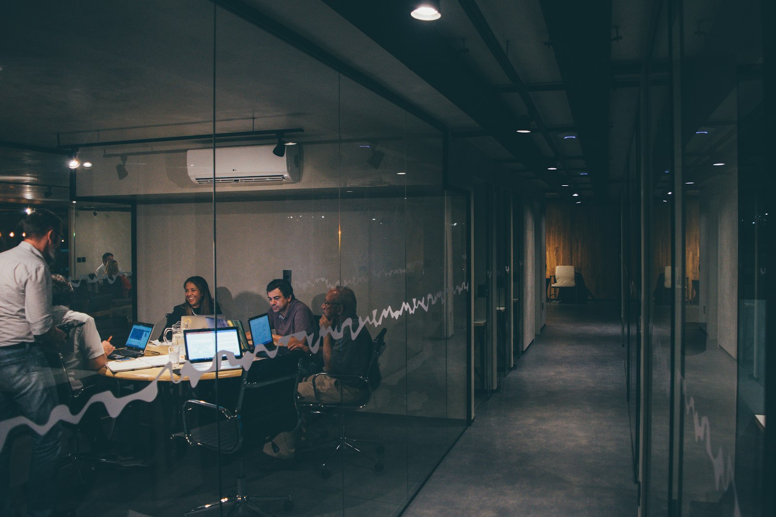 Team of professionals analyzing data in a business meeting